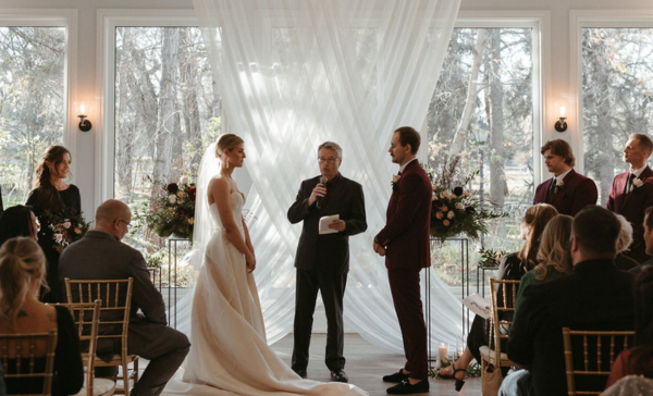Indoor Ceremony at The Norland Historic Estates, a Alberta Destination Wedding Venue
